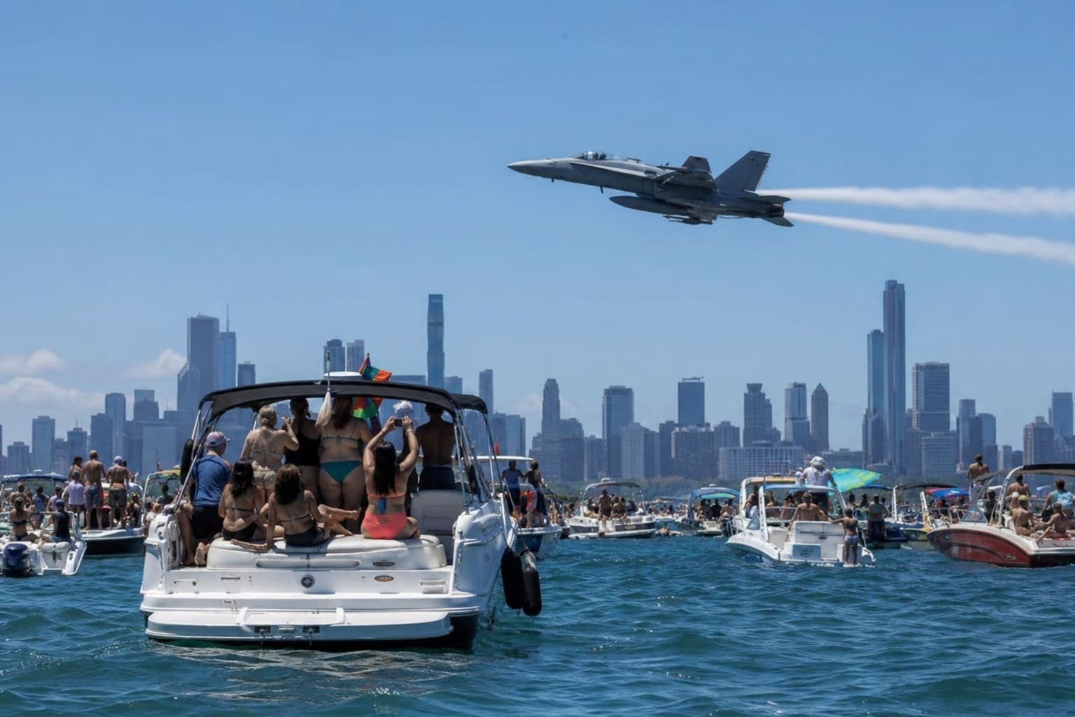 Air and Water Show jets over Lake Michigan with spectator boats